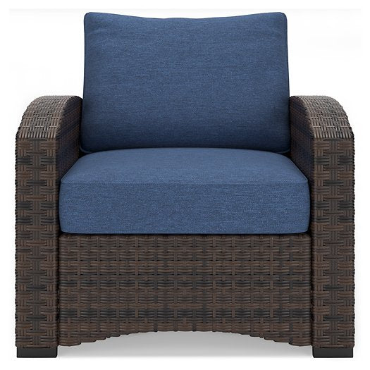 Windglow Outdoor Lounge Chair with Cushion - The Warehouse Mattresses, Furniture, & More (West Jordan,UT)